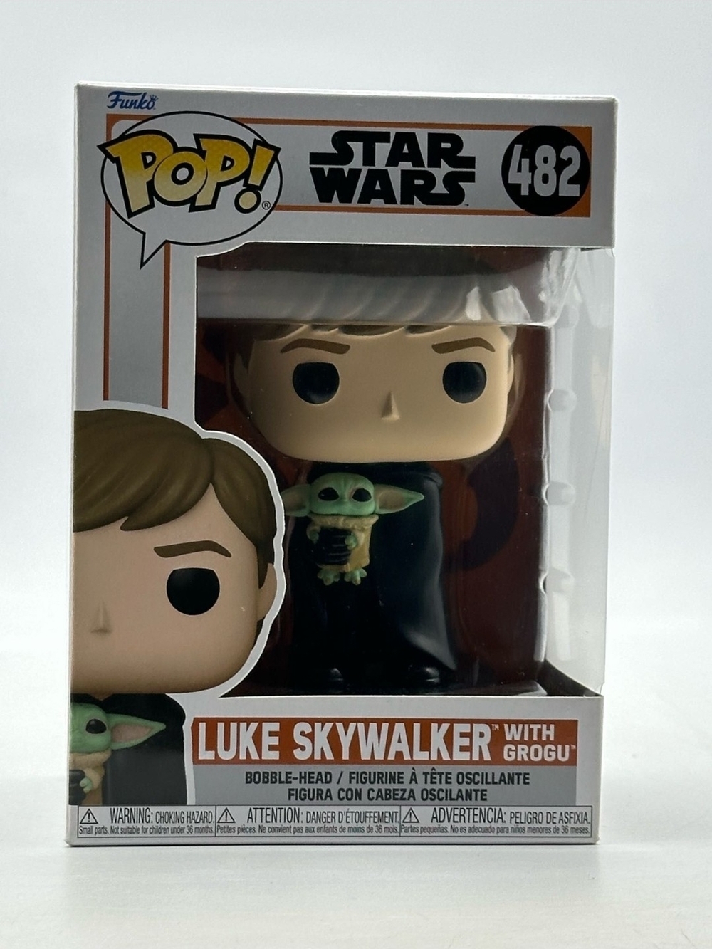 Funko Pop! Star Wars Luke Skywalker with Grogu - Black, Green, Tan